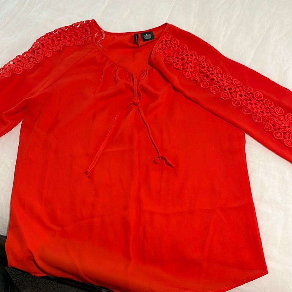 Red blouse with lace detail sleeves